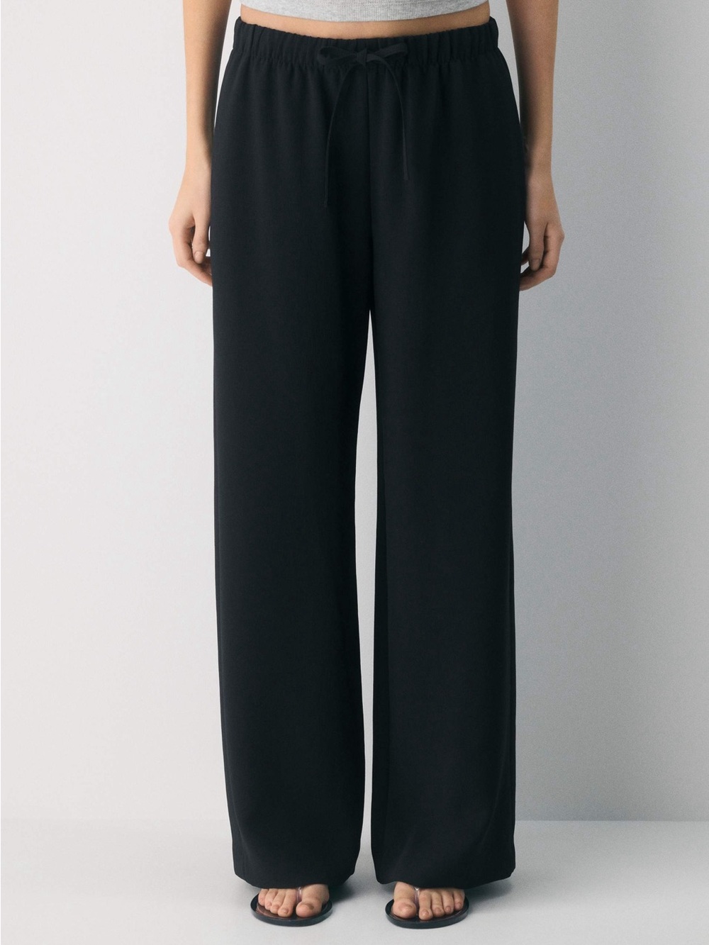 Aritzia Lodge Pants in Crepette fabric.